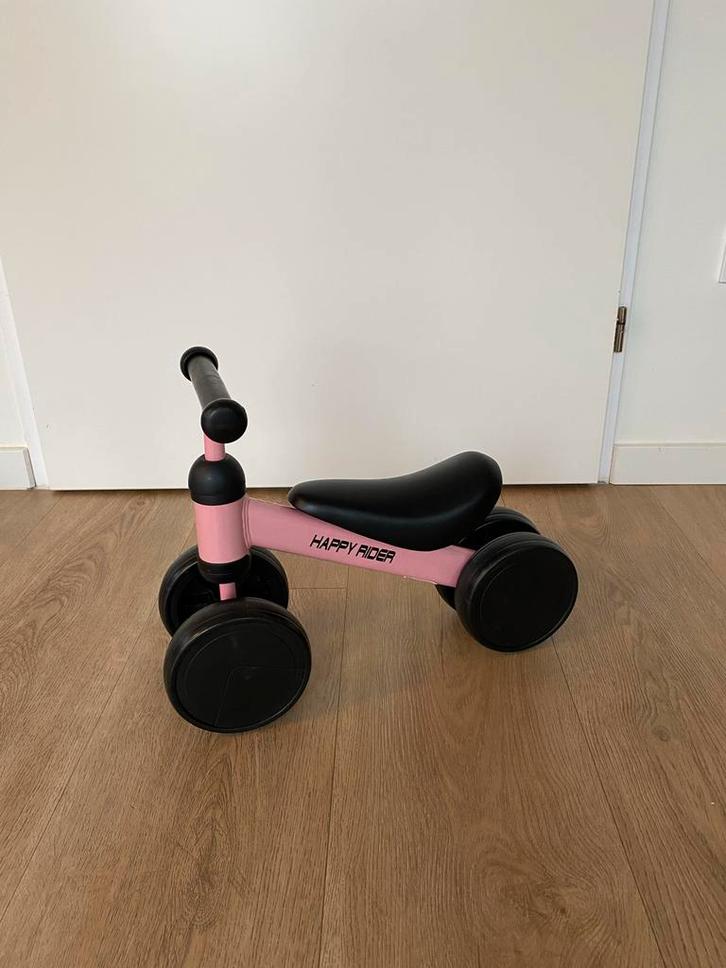 Roze Happy Rider loopfiets - kinderfiets, Kinderen en Baby's, Speelgoed | Buiten | Voertuigen en Loopfietsen, Gebruikt, Loopfiets