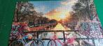 FIETSEN IN AMSTERDAM. Leuke legpuzzel 1000stukjes  € 3.50., Ophalen of Verzenden, 500 t/m 1500 stukjes