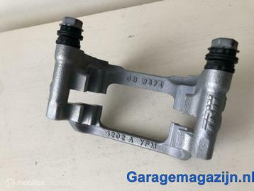 Remklauw houder TRW VW Golf / Passat origineel 5QM615425A beschikbaar voor biedingen