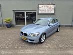 BMW 1-serie F21 114i Business+ Navi/Leder/Ketting Vervangen, Auto's, BMW, 1-Serie, Achterwielaandrijving, Beige, 4 cilinders