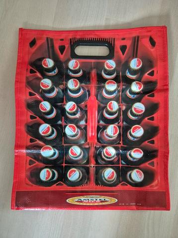 Tas met krat Amstelbierflesjes als opdruk voor de verzamelaa beschikbaar voor biedingen