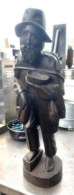 Houten Beeld, Ophalen