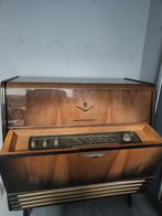 Grundig radio meubel Type nummer 7028, Ophalen