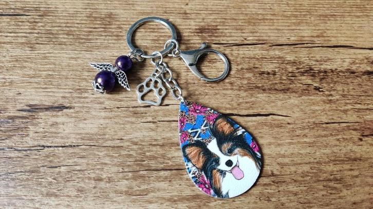 Hanger Vlinderhondje - Papillon leer beschermengeltje, Hobby en Vrije tijd, Kralen en Sieraden maken, Nieuw, Hanger, Verzenden