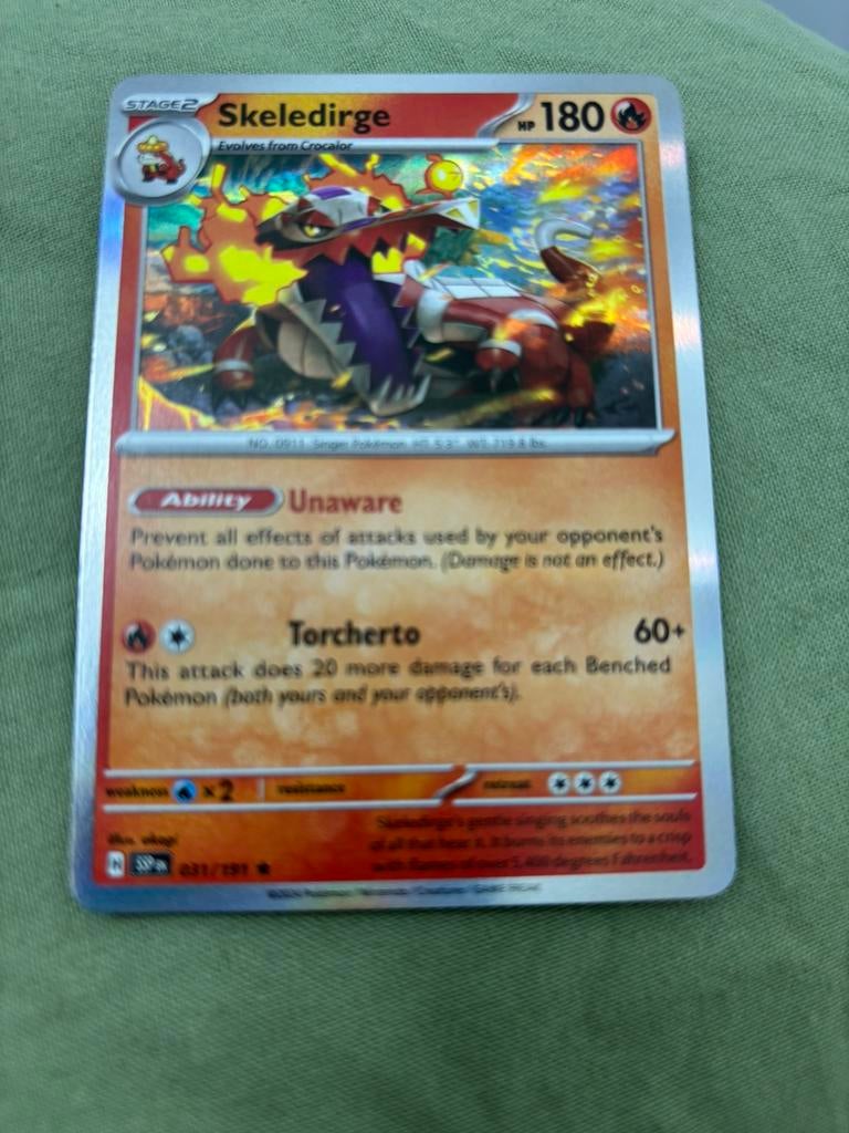 Skeledirge 031/191 nm-m holo Surging Sparks, Ophalen of Verzenden, Zo goed als nieuw