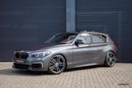 BMW 1-serie M140i xDrive | Schuifdak | HK | Camera | Mosselm, Gebruikt, Alcantara, 340 pk, Bedrijf