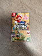 New Super Mario Bros. U Deluxe, Spelcomputers en Games, Games | Nintendo Switch, 3 spelers of meer, Ophalen, Zo goed als nieuw