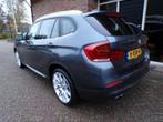 BMW X1 SDrive20i High Executive Automaat / Leder / Panoramad, Auto's, 4 cilinders, 184 pk, SUV of Terreinwagen, Zilver of Grijs