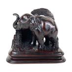 Olifant boekensteun - Art déco - Indonesië - Verbronsd