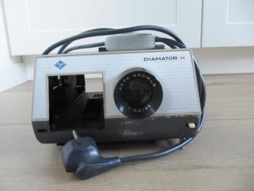 Diaprojector gratis beschikbaar voor biedingen