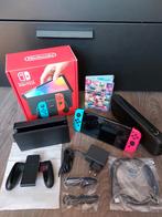 Nintendo Switch OLED 2024 100% compleet + Mario Kart 8, Ophalen of Verzenden, Zo goed als nieuw, Met 2 controllers, Switch OLED