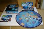 sealive bordspel in blik met 2dvd,s 4duikers en speluitleg, Hobby en Vrije tijd, Een of twee spelers, Ophalen of Verzenden, Zo goed als nieuw