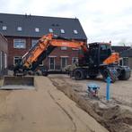 Doosan DX165W 2017 met draaikantelstuk & gripper, Zakelijke goederen, Machines en Bouw | Kranen en Graafmachines, Ophalen, Kraan