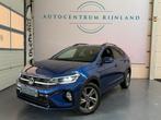 Volkswagen Taigo 1.0 TSI R-Line Camera, Navi, 1 Jaar BOVAG G, Auto's, Voorwielaandrijving, 1131 kg, Stof, Blauw