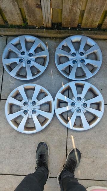 Setje 4 Kia originele wieldoppen 15 inch beschikbaar voor biedingen