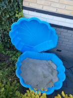 Zandbak Schelp met Zand, Ophalen