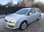Ford FOCUS Wagon 1.8-16V Ambiente Flexifuel Airco/Cruise/Sto, Auto's, Ford, Stof, Zwart, 4 cilinders, Handgeschakeld