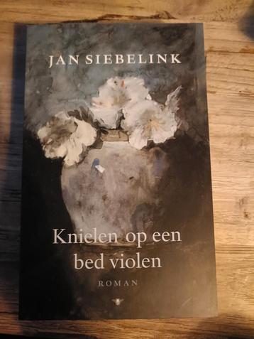 Jan Siebelink - Knielen op een bed violen beschikbaar voor biedingen