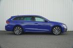 Skoda Octavia Combi 1.4 TSI 204pk iV PHEV Business Edition P, Auto's, Skoda, 12 maanden, Stof, Blauw, Plug-in hybride