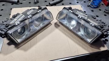 Koplampen set E38 PFL Xenon in zeer nette staat. beschikbaar voor biedingen