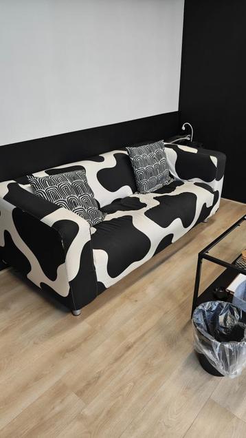 IKEA Klippan bank met koeienhoes beschikbaar voor biedingen