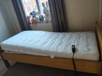 Electrische bed met neet matrass, Ophalen
