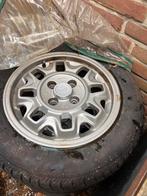 Originele Audi velgen 4x100 ZELDZAAM. Incl naafkapjes, Ophalen, 14 inch, Gebruikt, Velg(en)