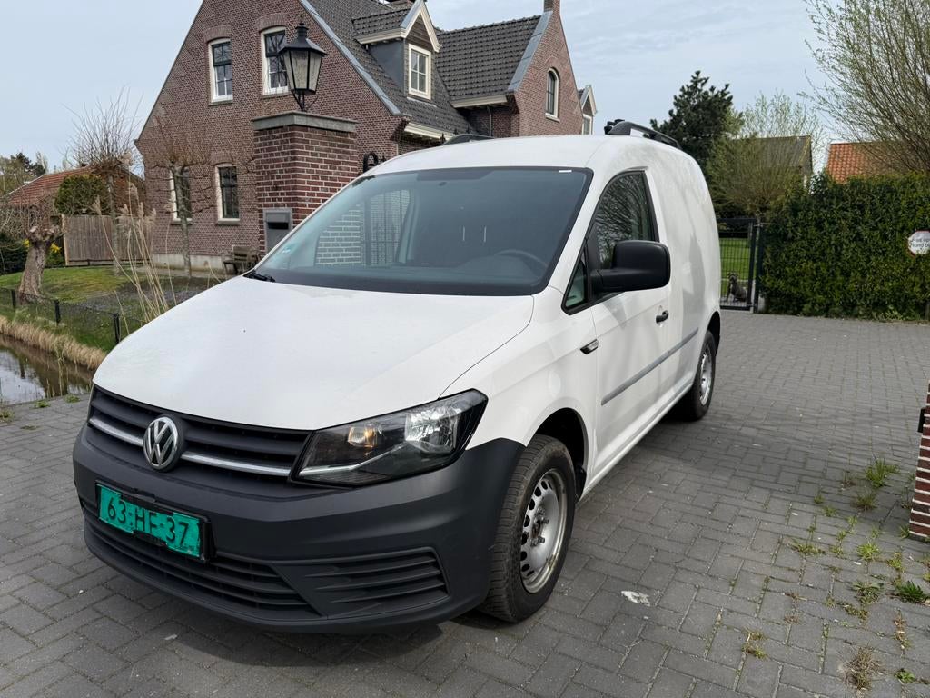 Vw Caddy 1.2 tsi benzine grijs kenteken  bj 2018, Auto's, Bestelauto's, Voorwielaandrijving, Stof, 4 cilinders, Elektrische ramen