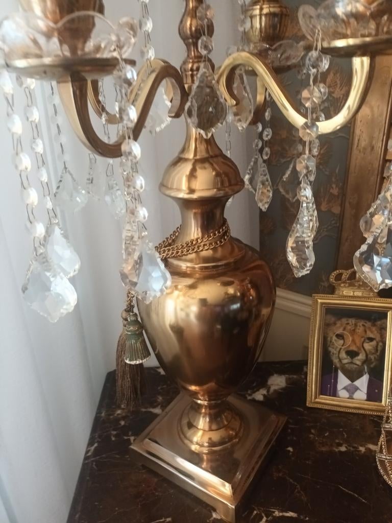 Grote koperen bol kandelaar, Ophalen