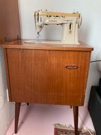 Singer 412 naaimachine in kast, Ophalen