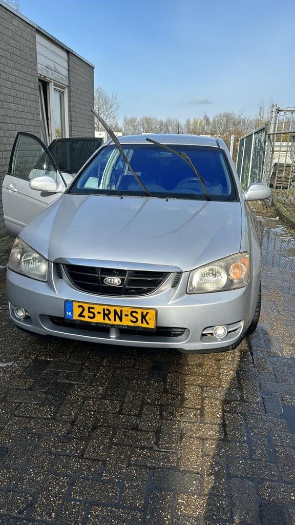 Kia Cerato 2.0 5DR AUT 2005 Grijs, Auto's, Kia, Cerato, Benzine, E, Hatchback, Automaat, Origineel Nederlands, Zilver of Grijs