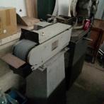 Huvema schuurbandmachine., Ophalen