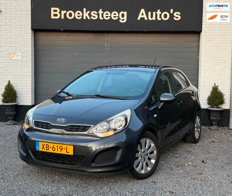 Kia Rio 1.2 CVVT Airco/5drs/USB/Zeernetjes, Auto's, Voorwielaandrijving, Euro 5, Gebruikt, Handgeschakeld