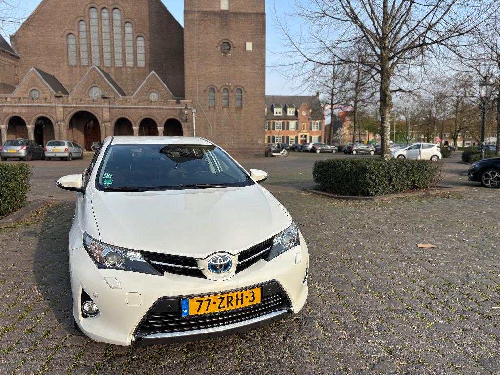 Toyota Auris 1.8 Hybrid 5DR 2013 Wit Executive full options, Auto's, Toyota, Wit, Origineel Nederlands, 26 km/l, Auris