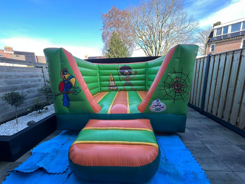 Springkussen jungle te huur, Ophalen, Zo goed als nieuw