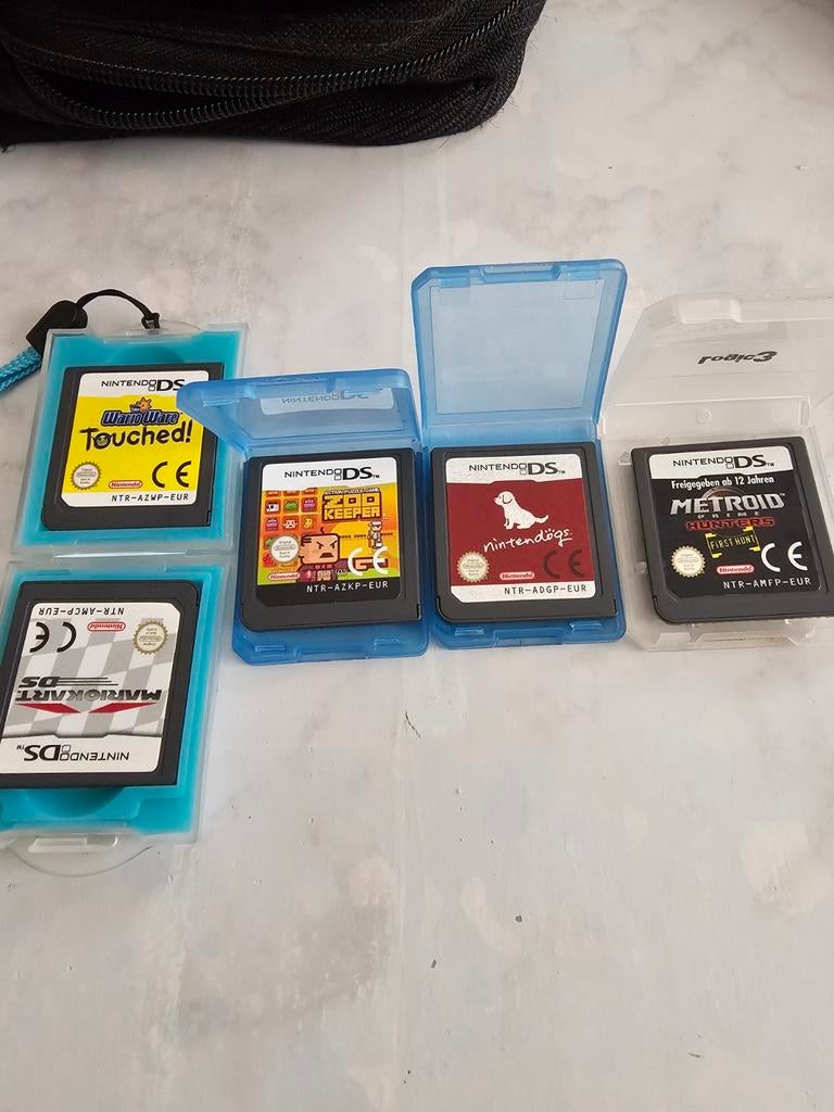 Nintendo DS games en stroom adapter, Ophalen