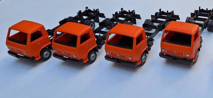 8 Vrachtauto's schaal 1:43 ex Fleischmann Magic Train, Hobby en Vrije tijd, Modelauto's | 1:43, Nieuw, Bus of Vrachtwagen, Overige merken