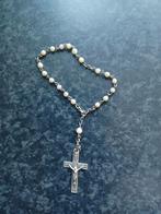 Rozenkrans ketting (wit), Ophalen