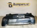Bumper Toyota Aygo 2005-2014 52159-0H030 Achterbumper E10-14, Gebruikt, 6 maanden garantie, Ophalen of Verzenden, Achter