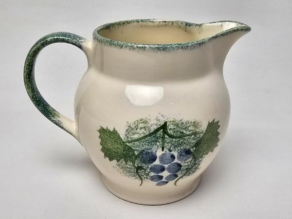# Poole Pottery england melk kan. Hand painted, Antiek en Kunst, Antiek | Servies los, Ophalen of Verzenden