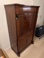 Secretaire kast, Ophalen