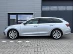 Skoda Octavia Combi 1.0 e-TSI Business Edition Plus ✓Autom, Auto's, Stof, Gebruikt, Met garantie (alle), 19 km/l