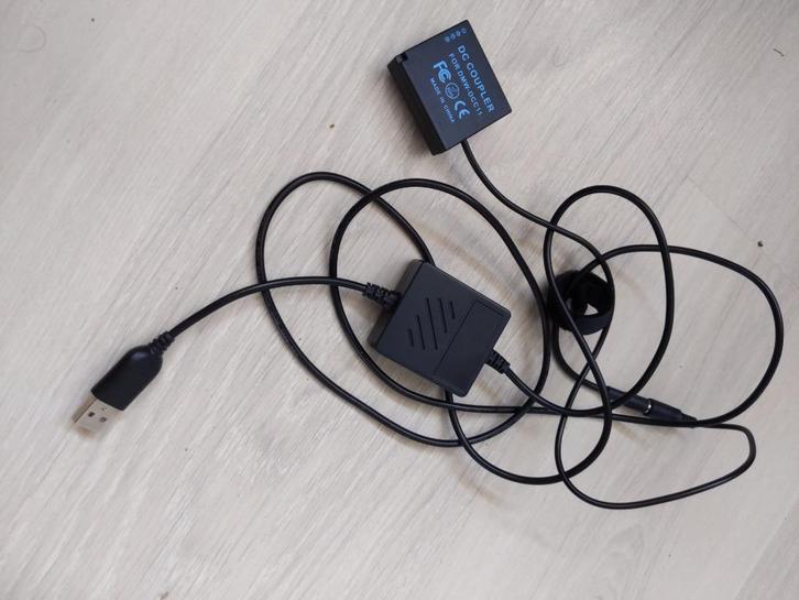DMW DCC11 continu stroom voor camera, Audio, Tv en Foto, Fotografie | Accu's en Batterijen, Zo goed als nieuw, Ophalen of Verzenden