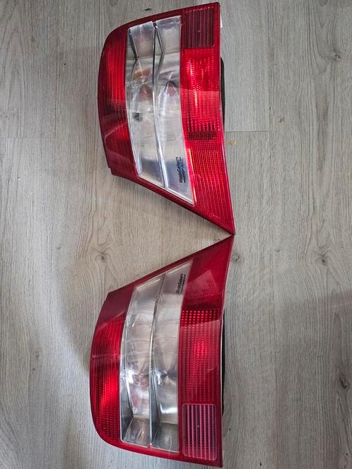 Golf 4 Hella Magic Red/Clear Tail Achterlichten, Auto-onderdelen, Verlichting, Nieuw, Ophalen of Verzenden
