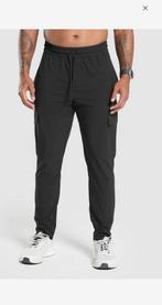 Gymshark stretch woven cargo pants  maat L, Maat 52/54 (L), Fitness, Nieuw, Ophalen of Verzenden