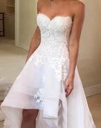 Nieuwe trouwjurk kort lang  €749 34 36 38 40 42 44, Ophalen, Nieuw, Wit, Trouwjurk