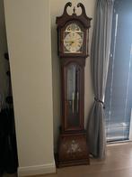 Staande klok, Ophalen