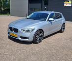 BMW 1-serie 114i Upgrade Ed,Leer,Xen,Crui,172NAP,NW ketting!, 1-Serie, Achterwielaandrijving, Gebruikt, Zwart