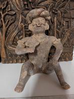 Antiek beeldje met gebruikerssporen, Ophalen