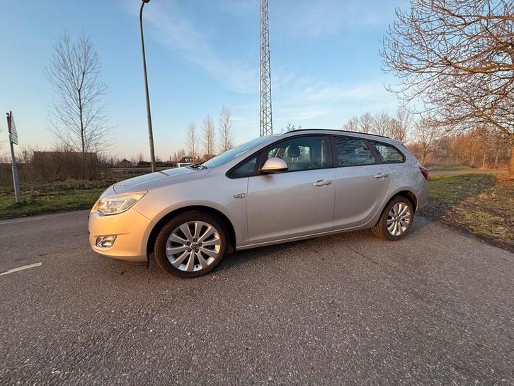 Opel Astra 1.4 Turbo 88KW ST 2011 Grijs, Auto's, Opel, Particulier, Astra, ABS, Airbags, Airconditioning, Apple Carplay, Bluetooth